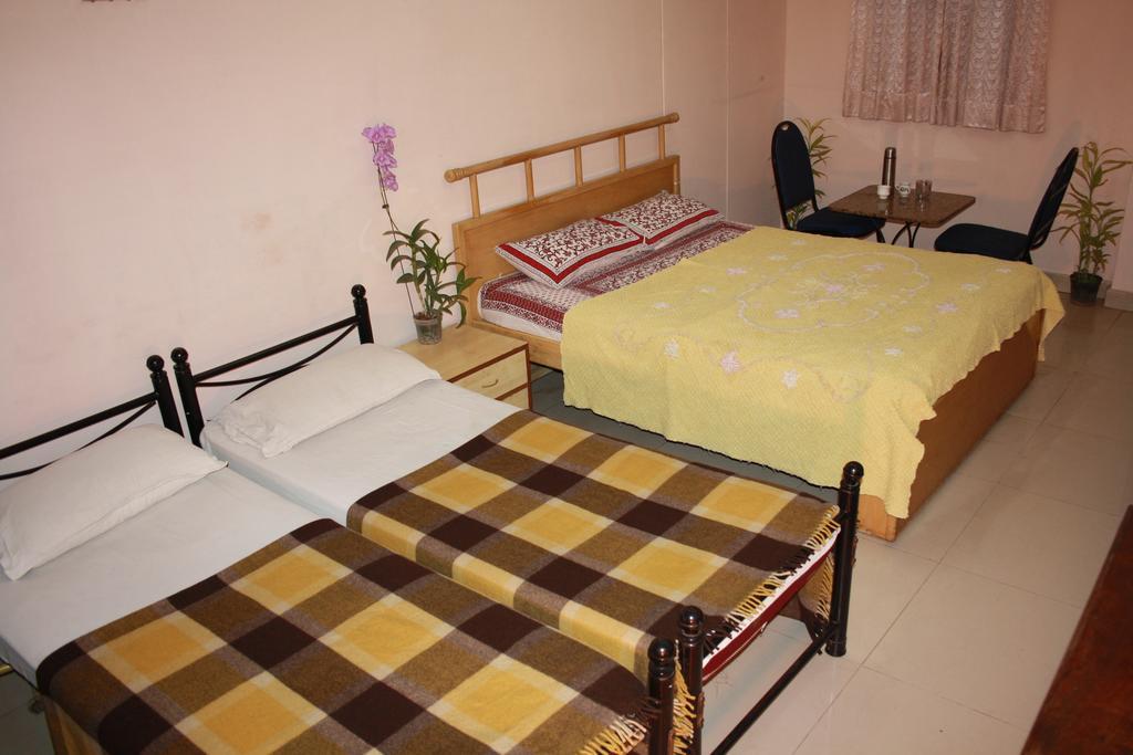 Minerva Residency Otel Bangalore Oda fotoğraf