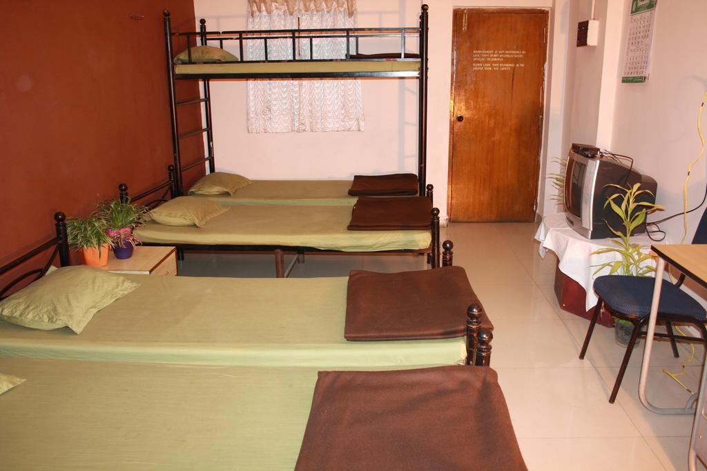 Minerva Residency Otel Bangalore Oda fotoğraf